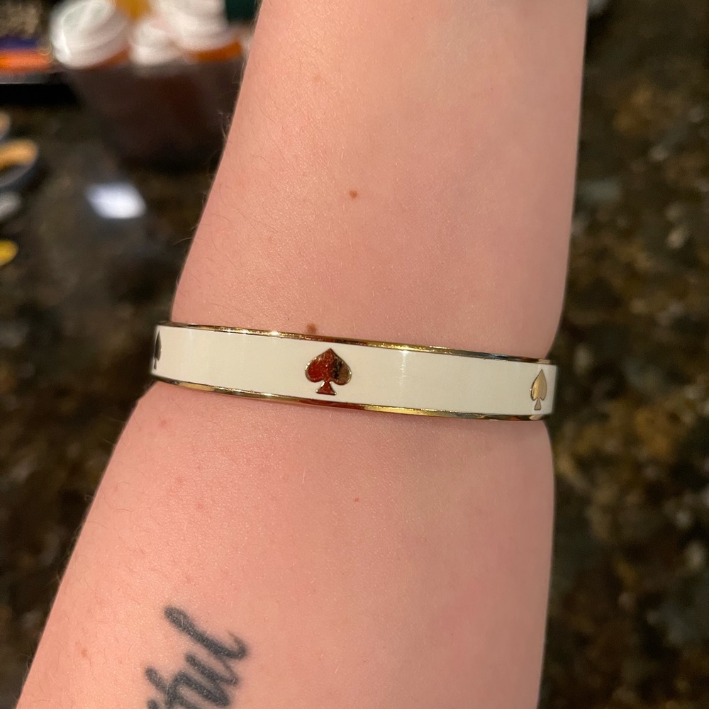 Kate Spade white and gold bangle